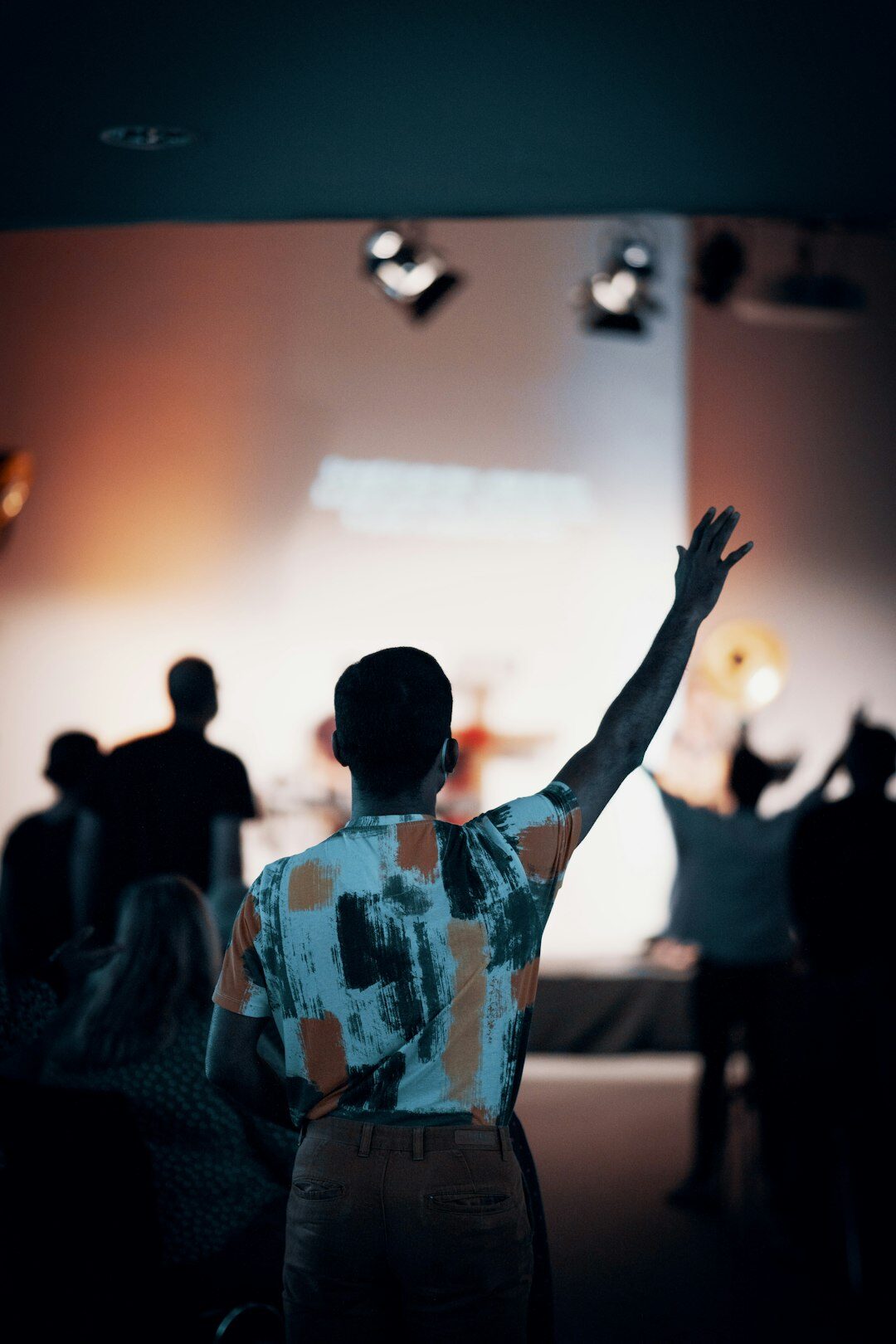 Person presenting ideas to a small audience